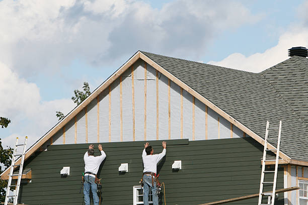 Professional Storm Damage Siding Repair technician working in Gasburg, VA